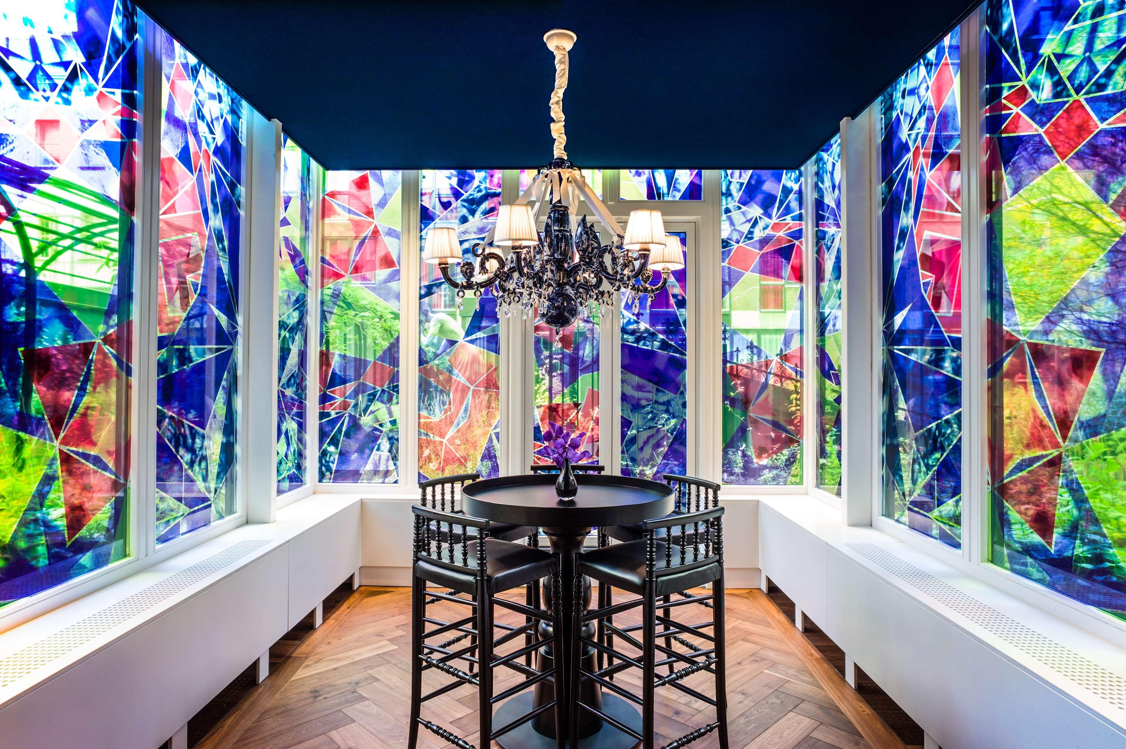 Andaz Amsterdam, Prinsengracht, By Hyatt Exterior foto The stained glass windows at the top of the staircase